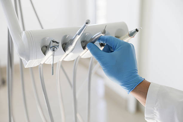 Professional Tooth Extraction technician working in St. Clair, MI